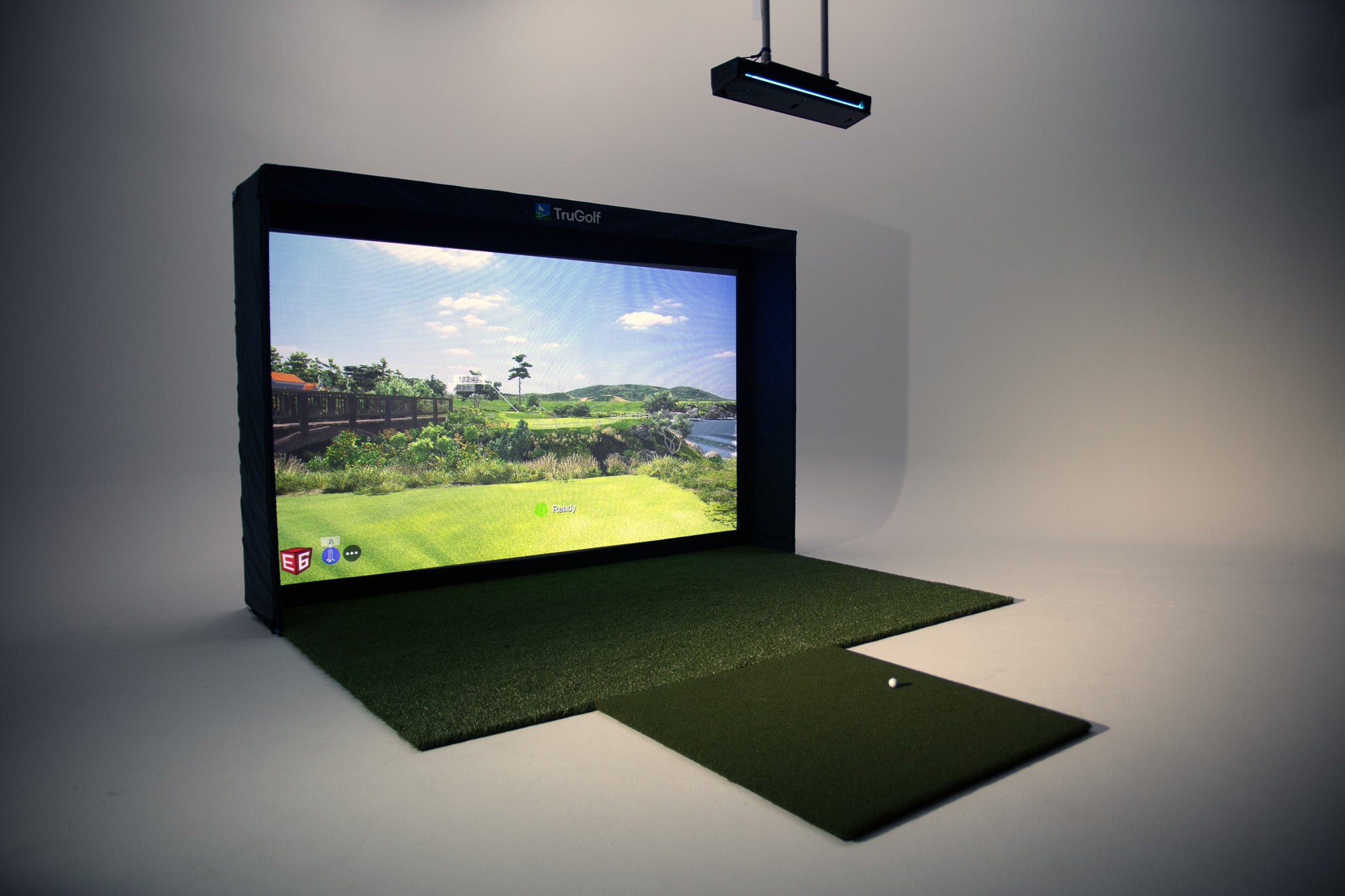TruGolf MAX professional golf simulator system with enclosure, projector, and E6 software
